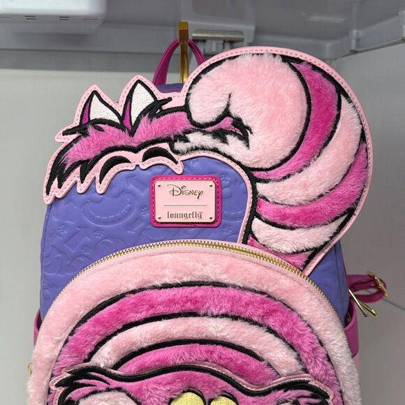 cheshire cat loungefly mini backpack Disney Cats Handbag Print Aristocats Pink : Clothing, Shoes & Jewelry debossed print lettering reads Loungefly Disney Alice in Wonderland